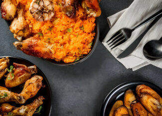 jollof-rice-in-black-plate-with-chicken-and-plantain-protein-rich-food