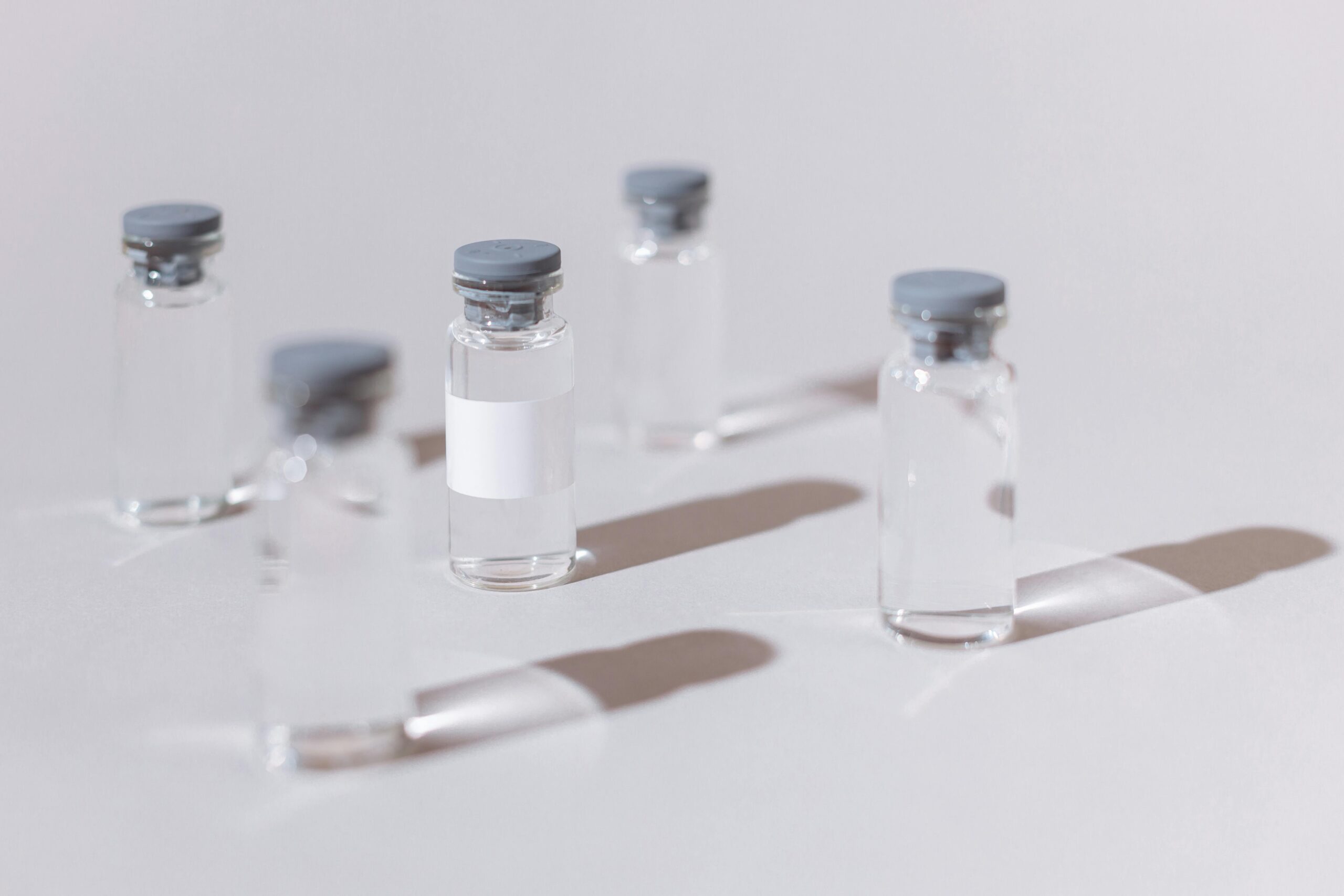 five-clear-vaccine-bottles-meningitis-vaccine